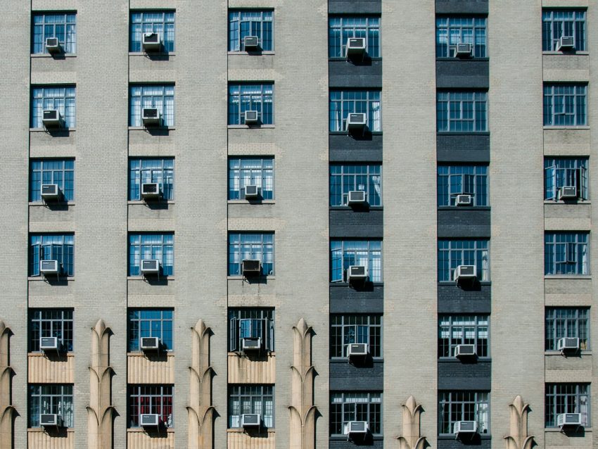 gray and black concrete building close-up photo