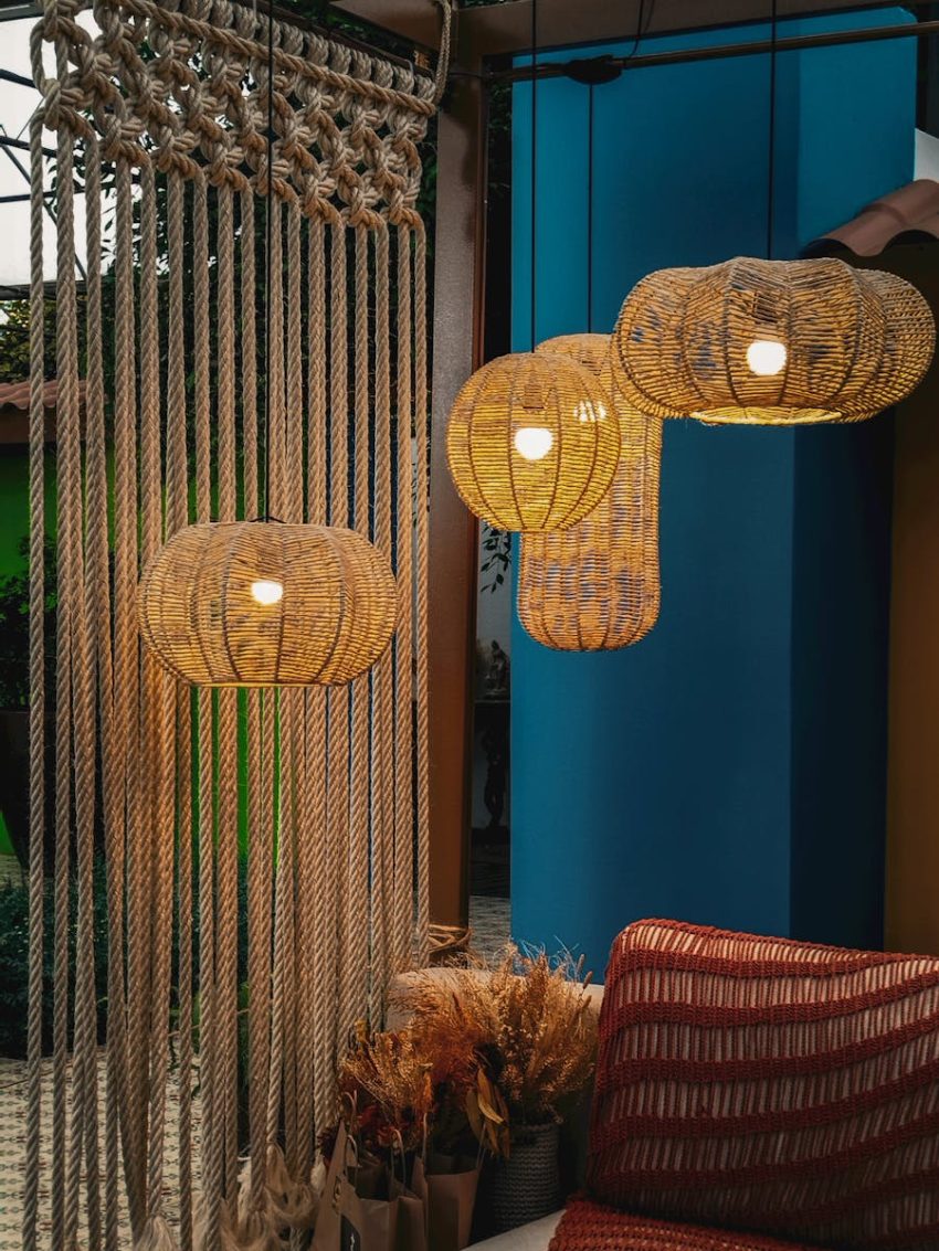 Warm and cozy interior featuring rattan lamps and textured ropes creates a soothing ambiance.